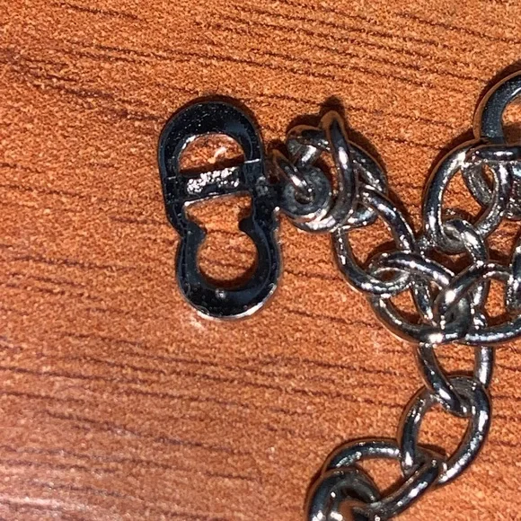 Authentic Christian Dior Leather and Metal Charm Bow Bracelet - Picture 5 of 11